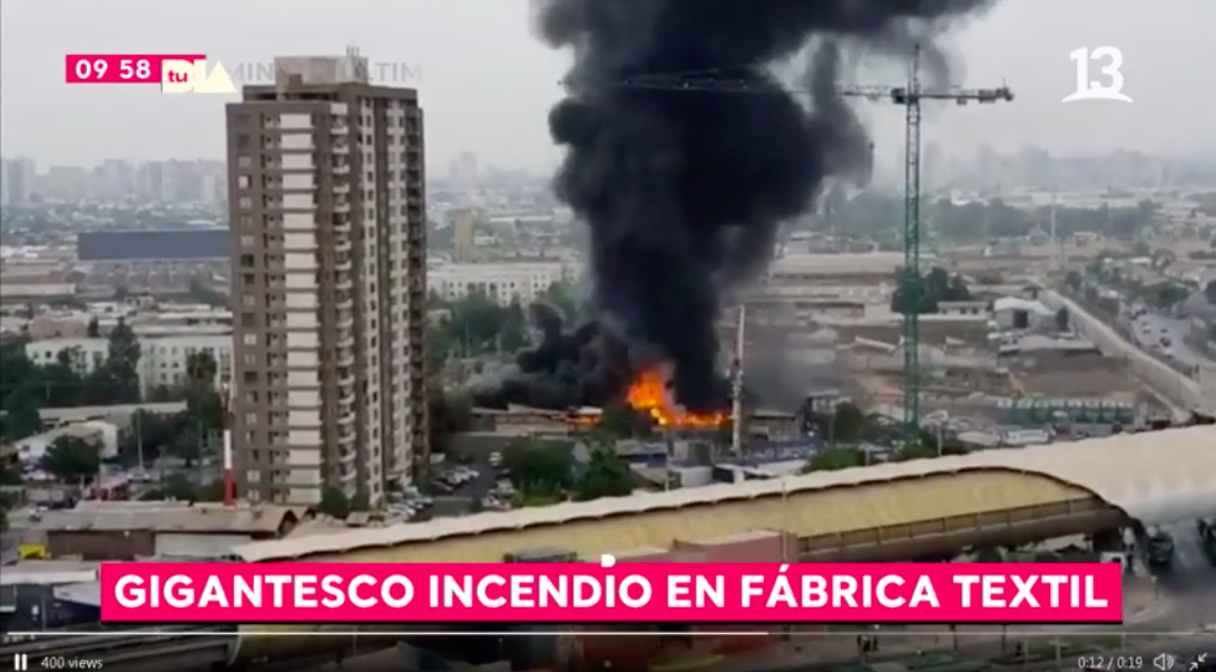 Gigantesco incendio en fábrica textil de San Joaquín